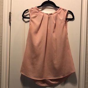 Pink sleeveless blouse